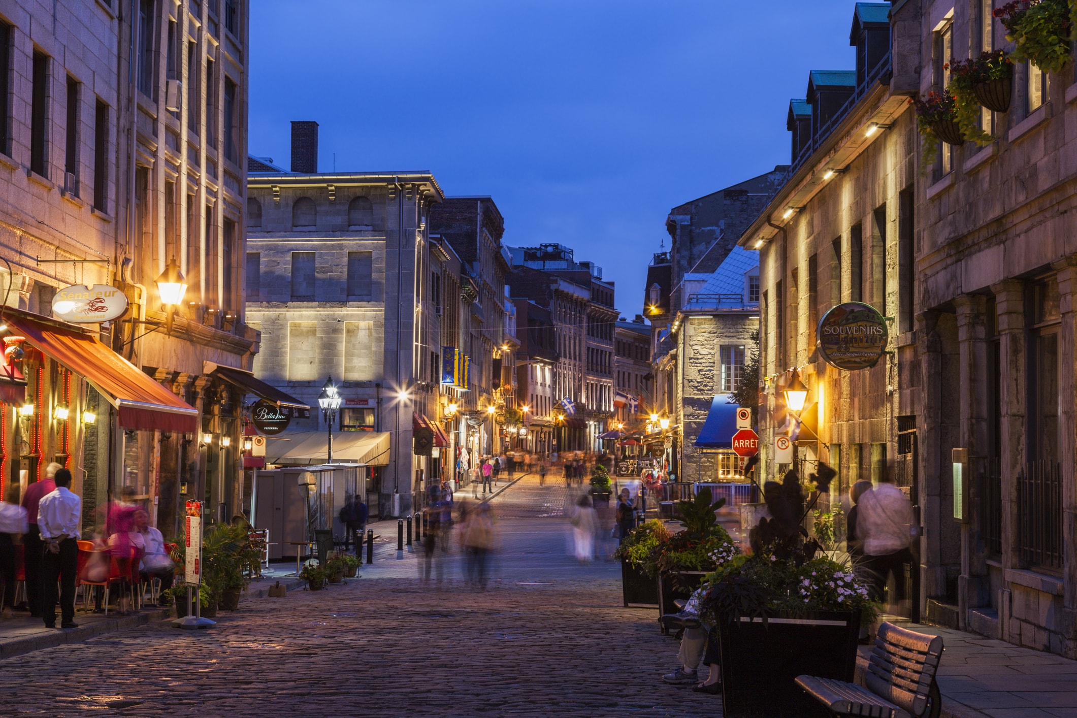 The cobblestone streets of Old Montreal in the evening.